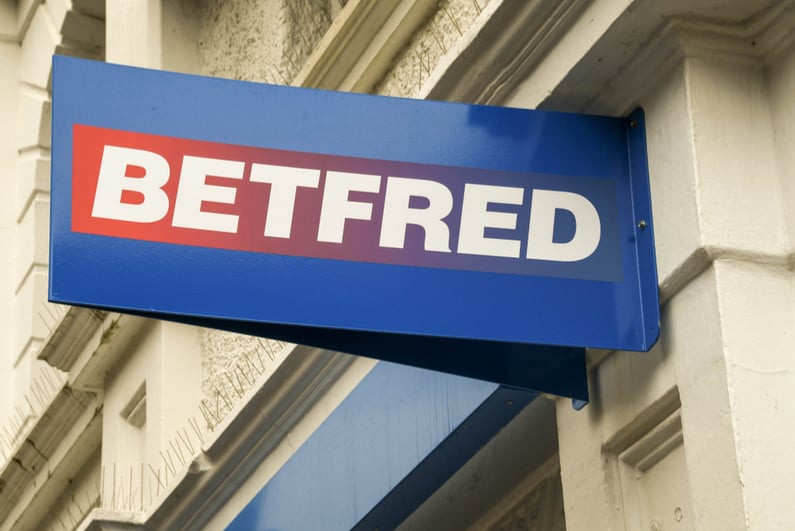 Sign above a Betfred betting shop