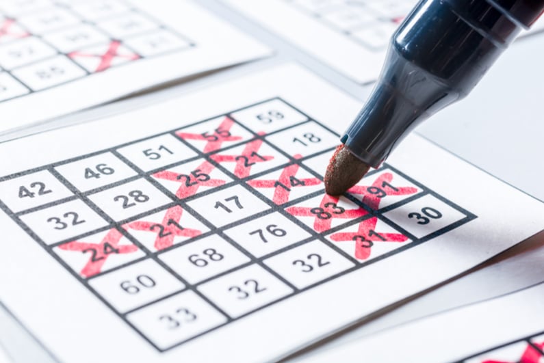 Bingo card being marked in red