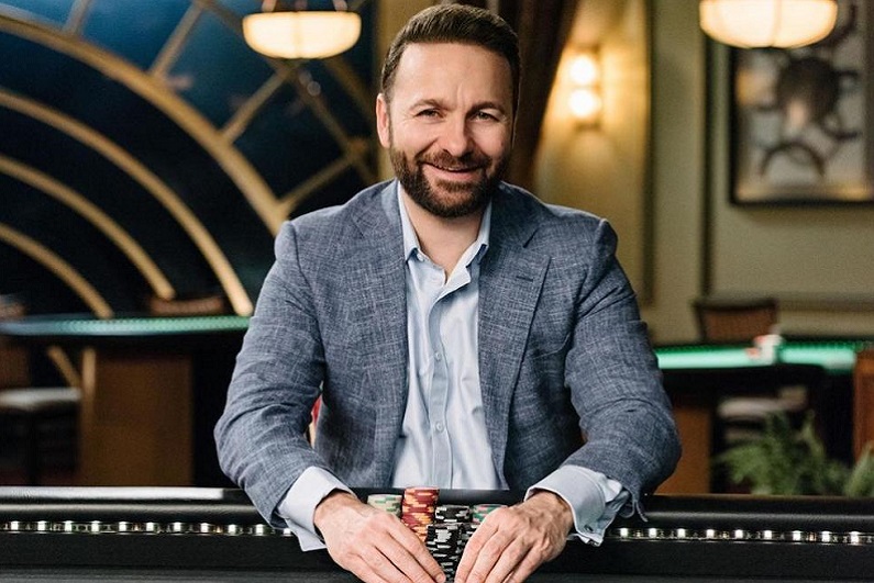 Daniel Negreanu sitting at poker table