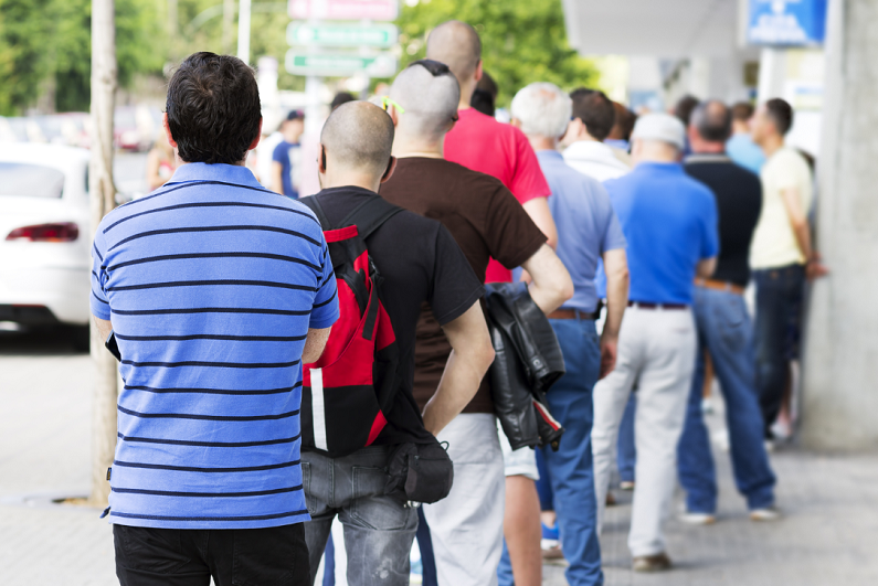 people in a queue outside