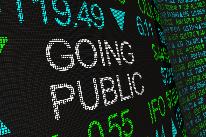 "GOING PUBLIC" typed on a stock trading screen