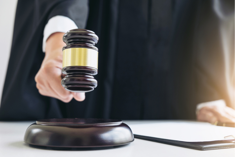 Closeup of judge banging a gavel