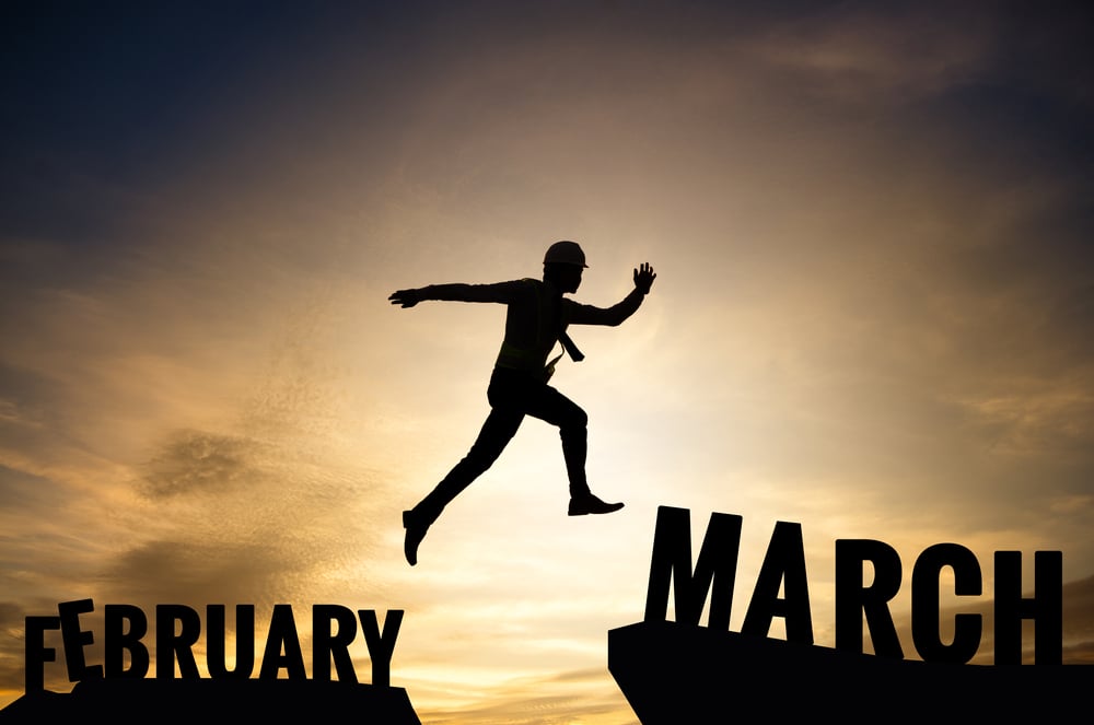 man jumping from February step to March step