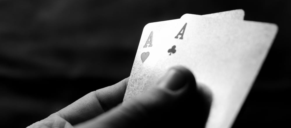 hand holds two Aces cards in poker