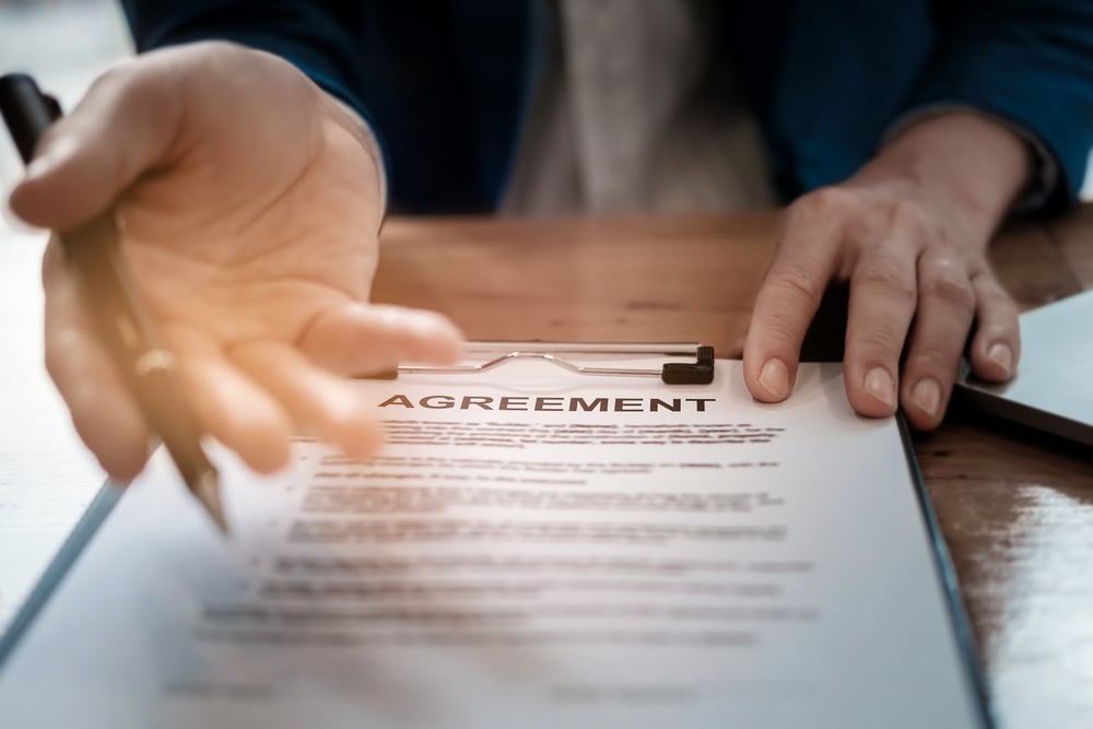 A businessman offering an agreement