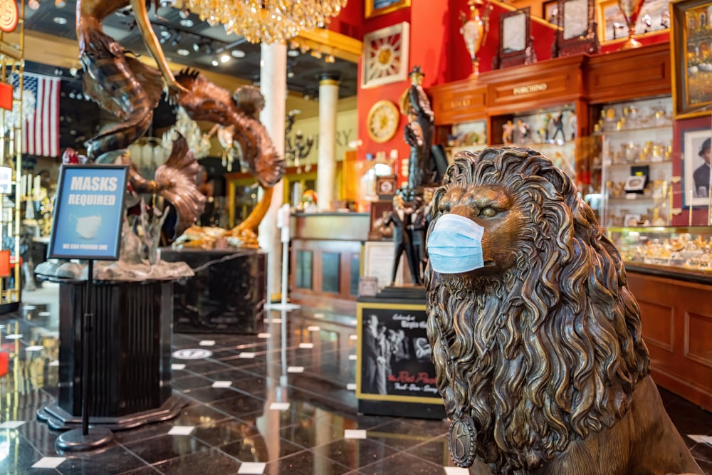 surgical mask placed on lion statue inside a Las Vegas casino